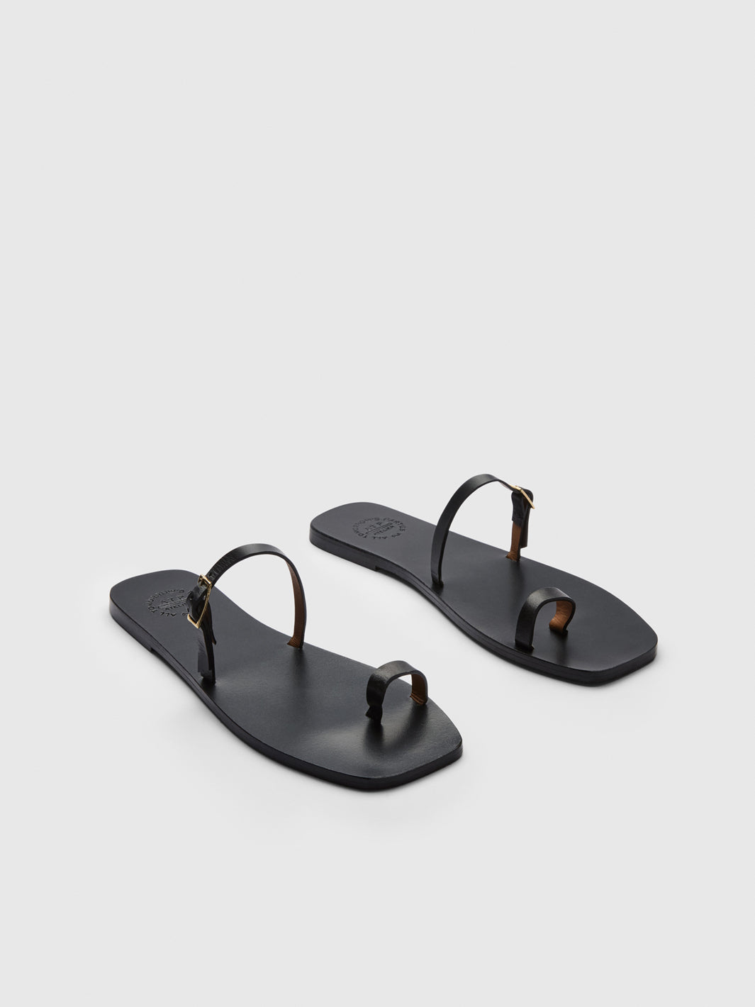 Dongo Black Leather Flat sandals