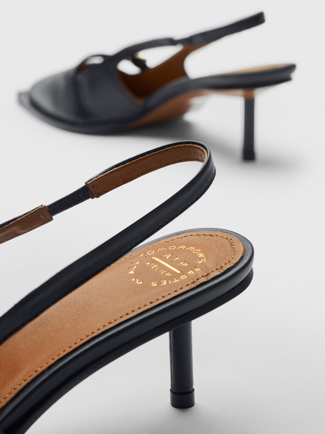 Mira Black Nappa Slingbacks