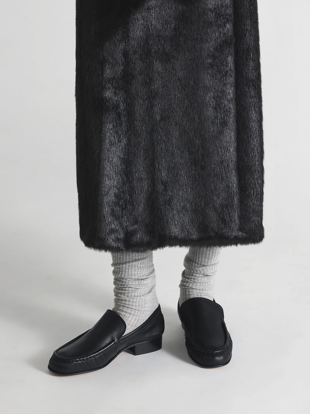 Rivello Black Leather Slip-ins